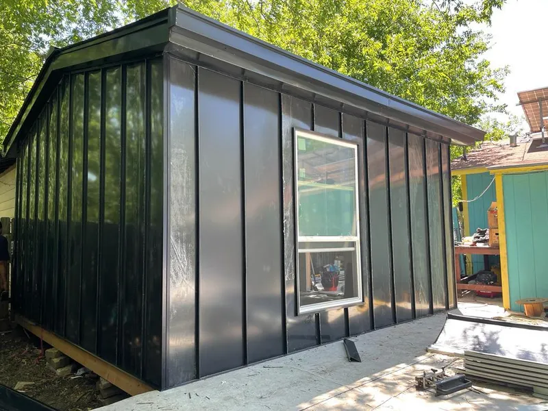 Black standing seam metal wall panels for Roof Inspection in West Linn